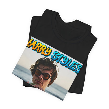 A black graphic t-shirt featuring a graphic related to Harry Styles' 'Watermelon Sugar' song or its viral impact.