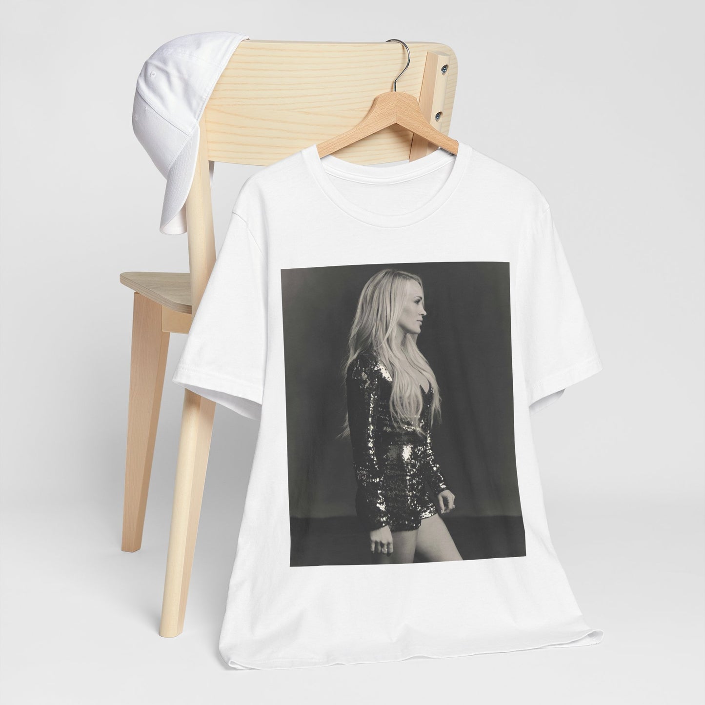 A black graphic t-shirt featuring a black and white photo of Carrie Underwood performing live on stage.