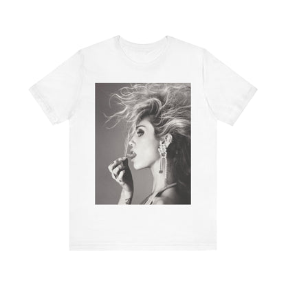 A black graphic t-shirt featuring a graphic of Miley Cyrus as a grunge rockstar.