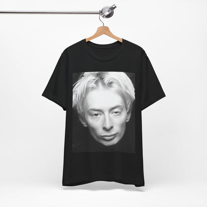 A black graphic t-shirt featuring a 90s black and white portrait photo of Thom Yorke from Radiohead.