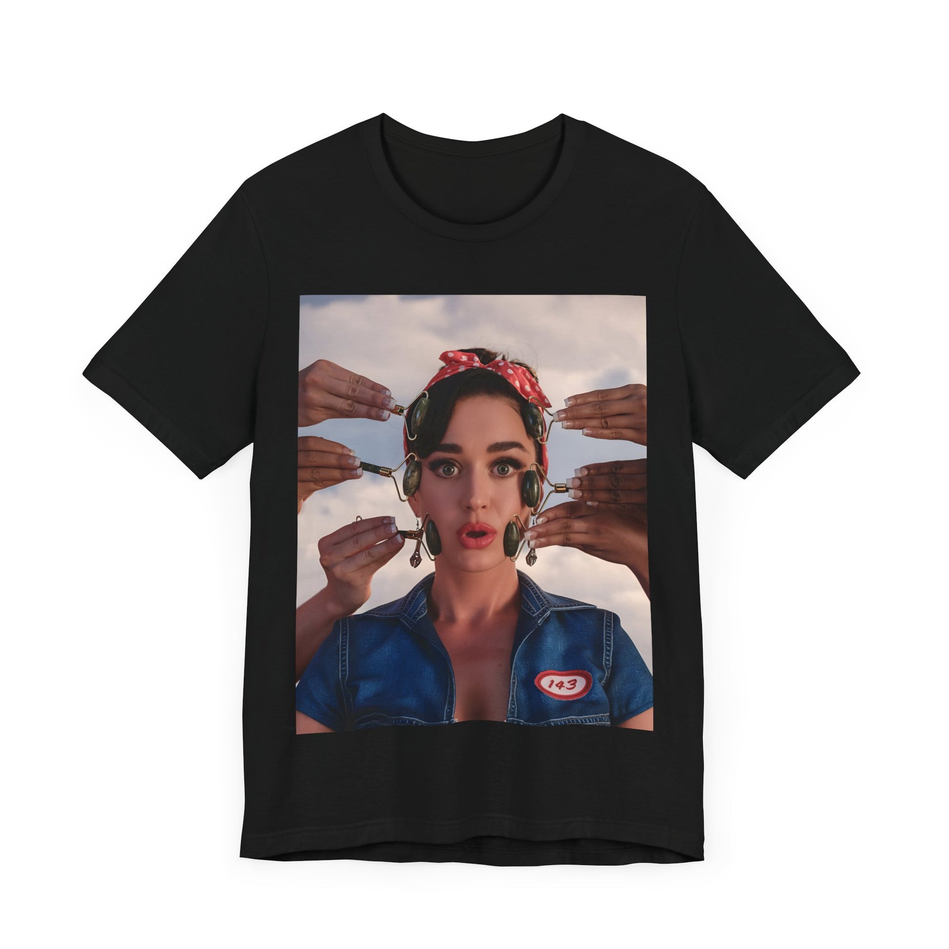 A black graphic t-shirt featuring a modern pop essential graphic of Katy Perry.