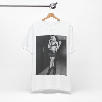 A black graphic t-shirt featuring a graphic of Ava Max with a 'rebel chic' or edgy pop aesthetic.