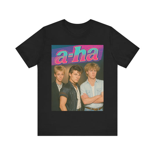 A black graphic t-shirt featuring a retro 80s-style band graphic for A-HA, possibly with band members in a stylized design.