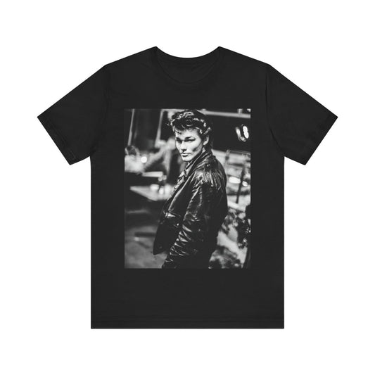 A black graphic t-shirt featuring a retro 80s tour graphic for the band A-HA, possibly showing concert elements or band members in a stylized design.