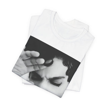 A black graphic t-shirt featuring a black and white graphic or photo portrait of Prince.