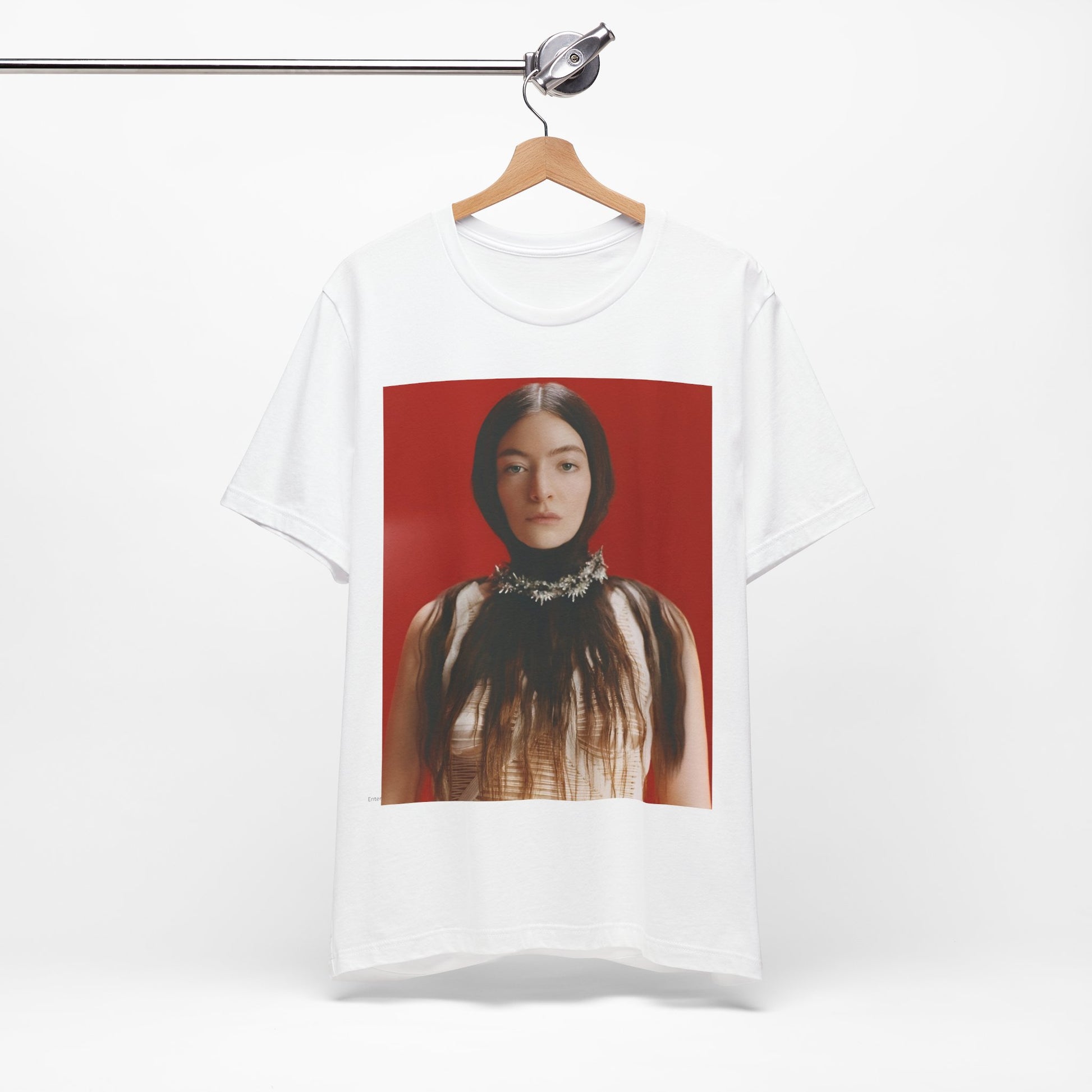 A black graphic t-shirt featuring a vintage indie pop icon graphic of Lorde.