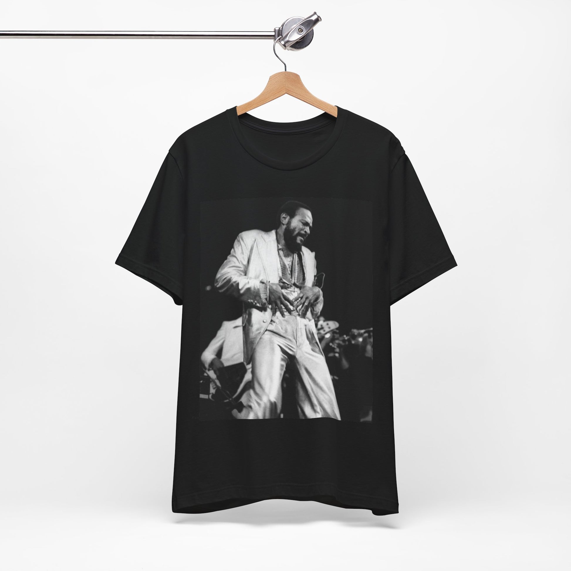 A black graphic t-shirt featuring a 70s Motown concert graphic of Marvin Gaye.