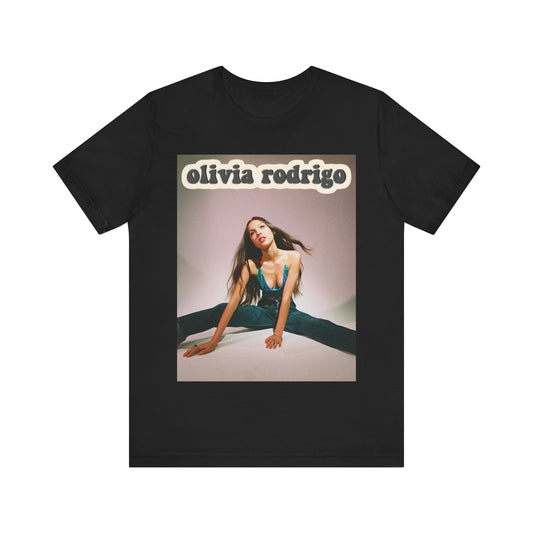 A black graphic t-shirt featuring a fierce graphic related to Olivia Rodrigo's 'good 4 u' song or era.