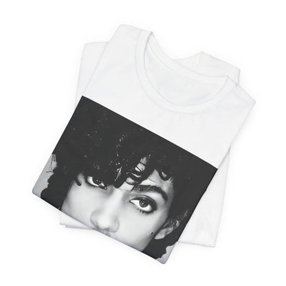 A black graphic t-shirt featuring a black and white photo portrait of Prince.
