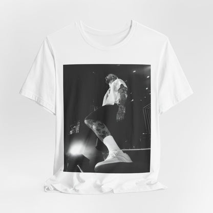 The abstract, geometric 'V' logo from the cover of the Maroon 5 album V, printed on a t-shirt.