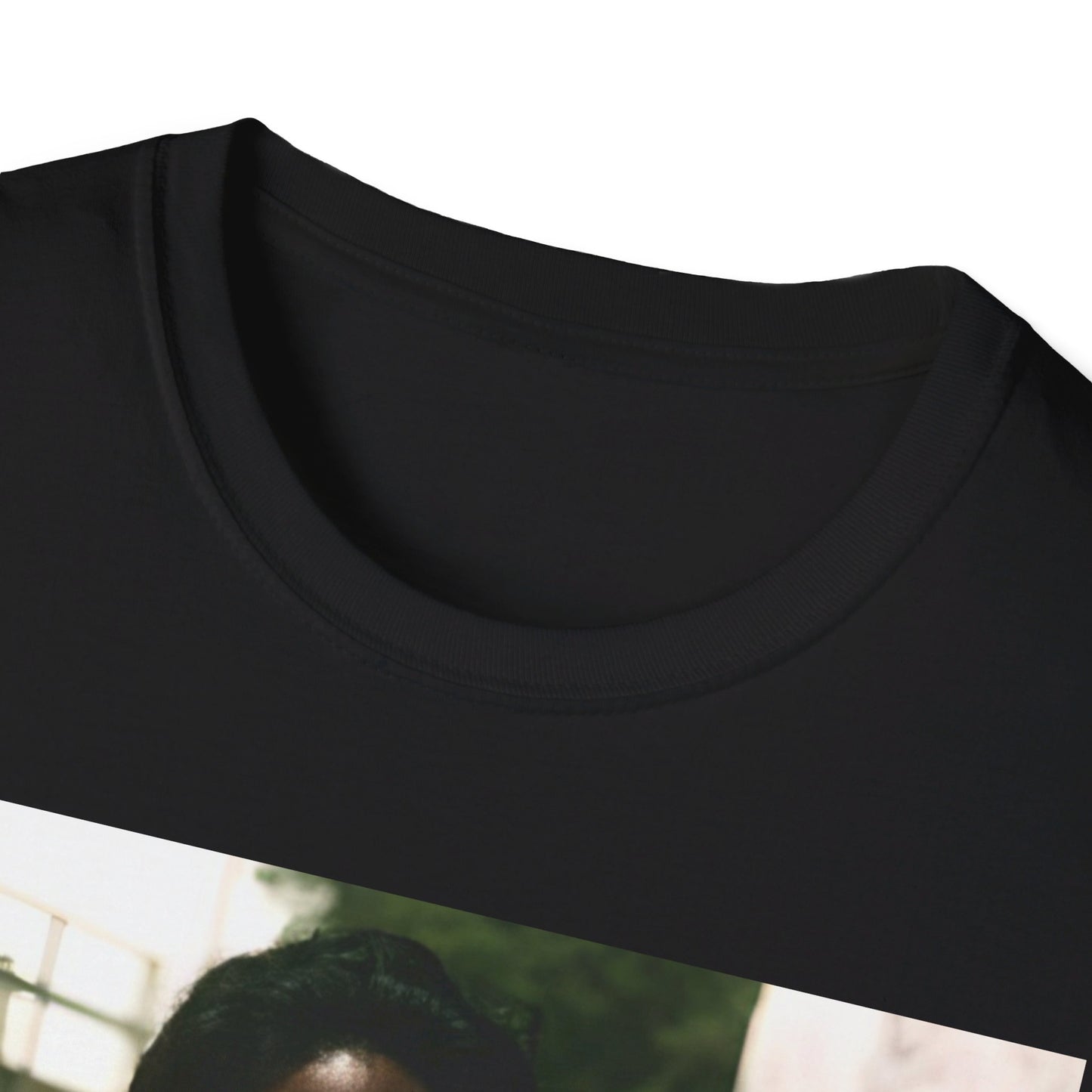 A black graphic t-shirt featuring a graphic of Barry White, emphasizing his romantic and soulful presence from the 1970s.