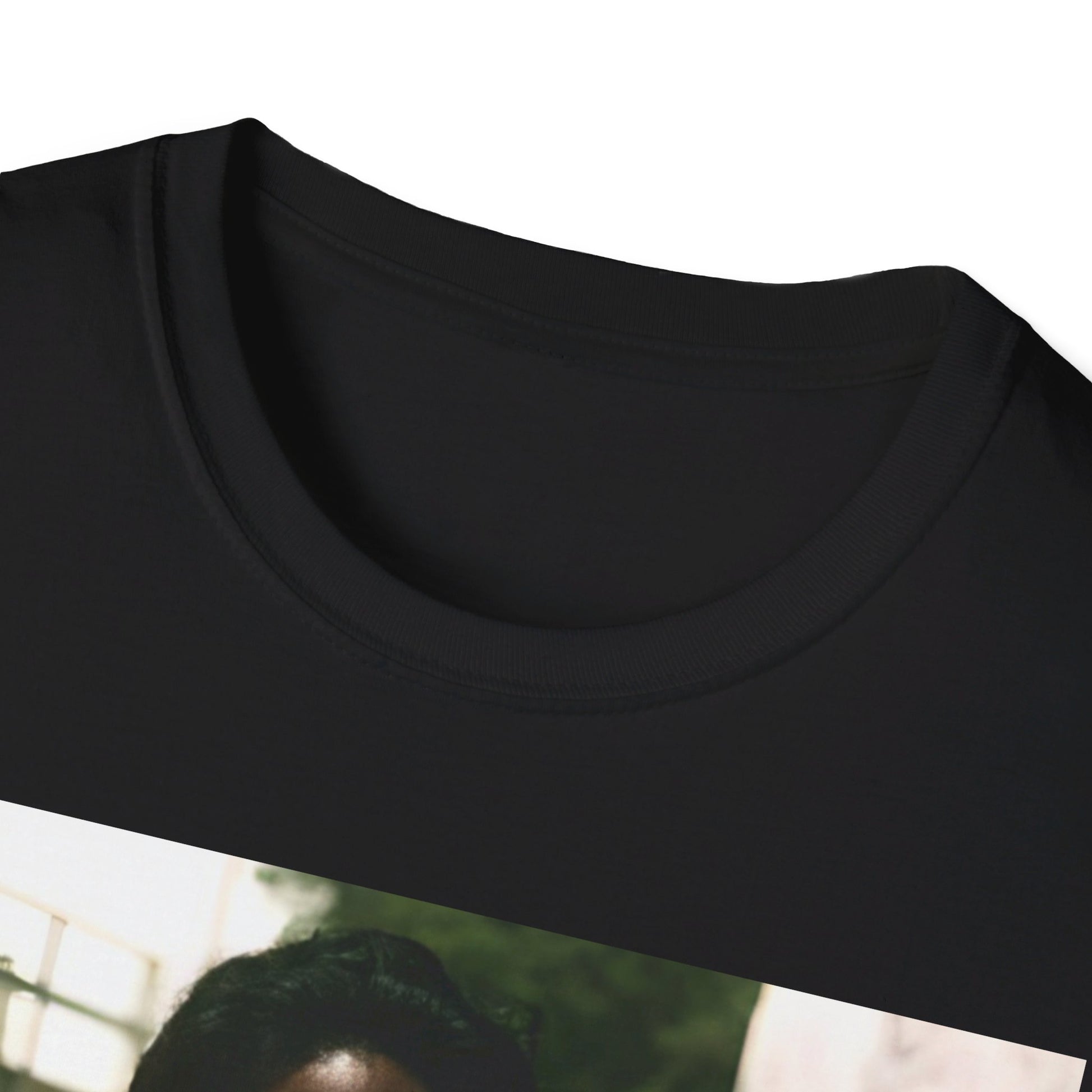 A black graphic t-shirt featuring a graphic of Barry White, emphasizing his romantic and soulful presence from the 1970s.