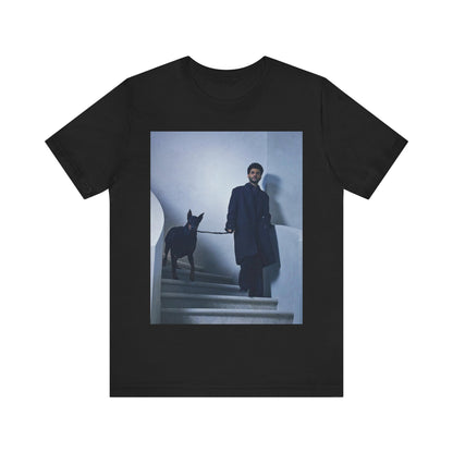 A black graphic t-shirt featuring a photo of The Weeknd with a doberman.