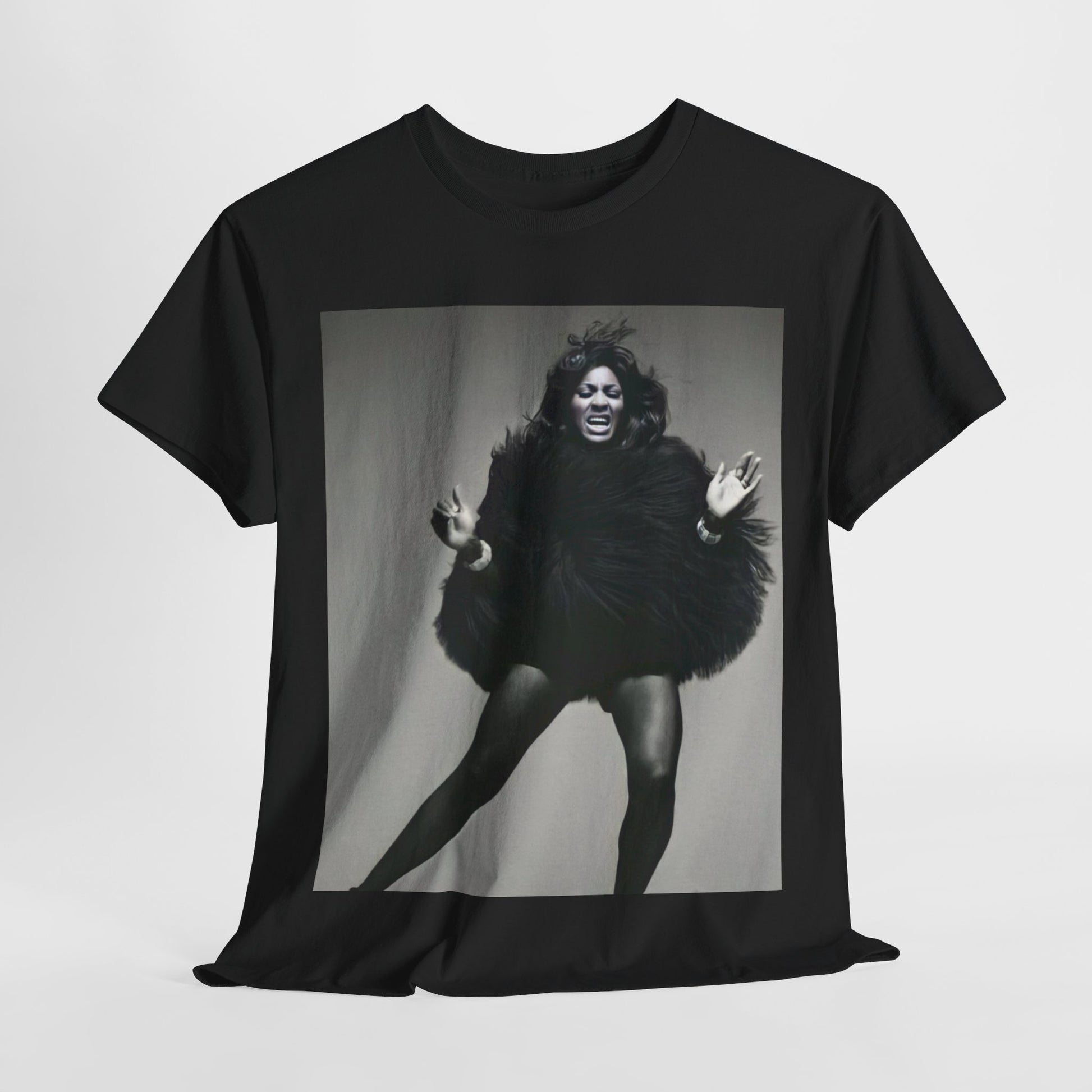 A black graphic t-shirt featuring a black and white portrait photo of Tina Turner.