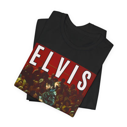 A black graphic t-shirt featuring a retro graphic related to an Elvis Presley special concert.