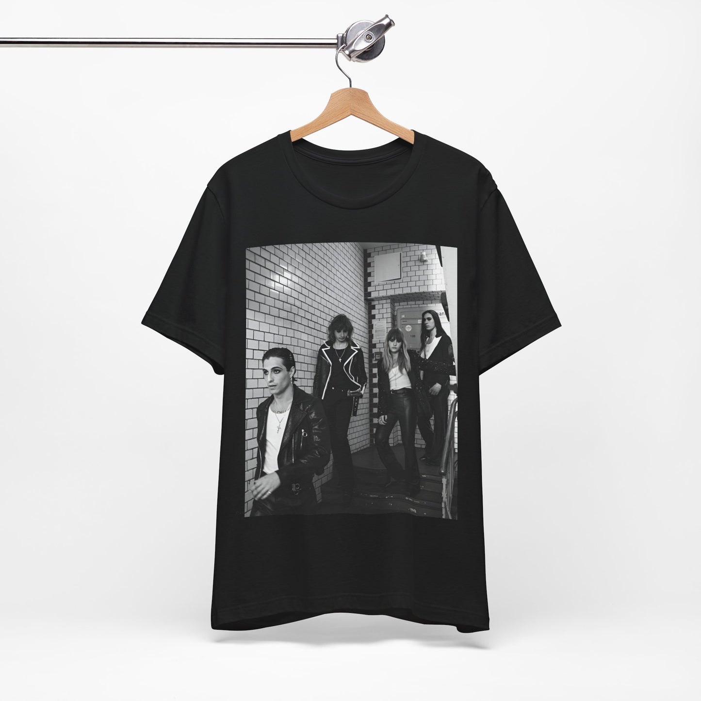 A black graphic t-shirt featuring a black and white graphic or photo of Maneskin in a backstage setting.