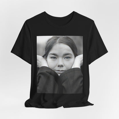 A black graphic t-shirt featuring a black and white portrait photo of Bjork.