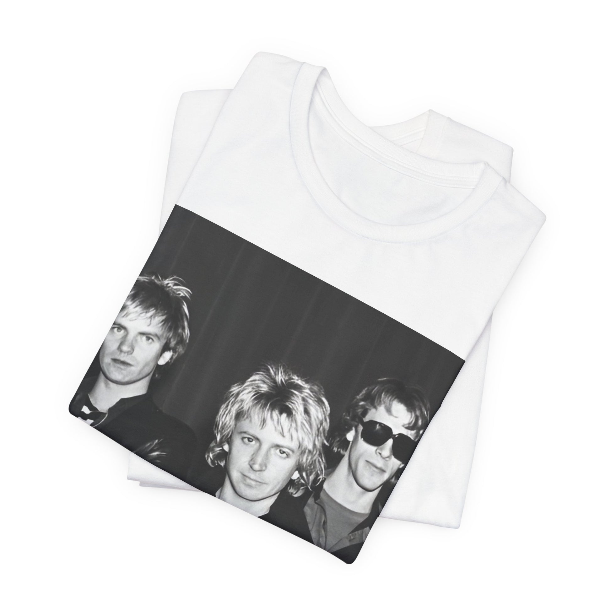 A black graphic t-shirt featuring a black and white, monochrome graphic or photo of The Police.