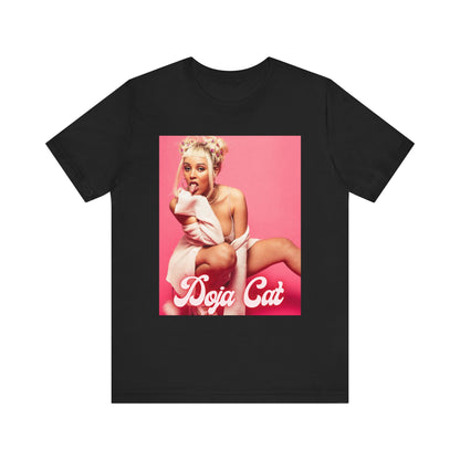 A black graphic t-shirt featuring a graphic related to Doja Cat's 'Woman' song or era.