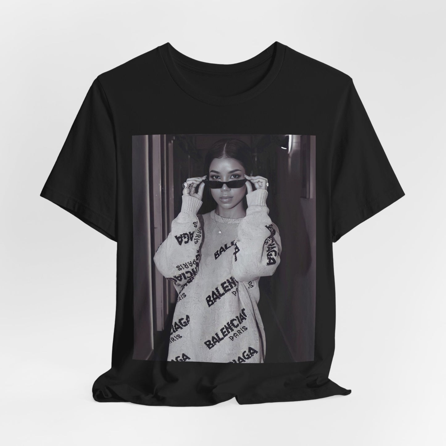 A black graphic t-shirt featuring a black and white, monochrome graphic or photo of Jhene Aiko.