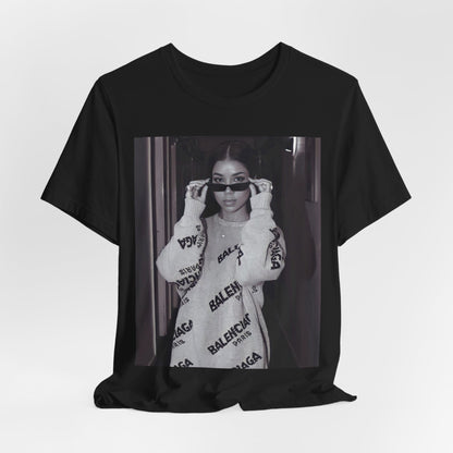 A black graphic t-shirt featuring a black and white, monochrome graphic or photo of Jhene Aiko.