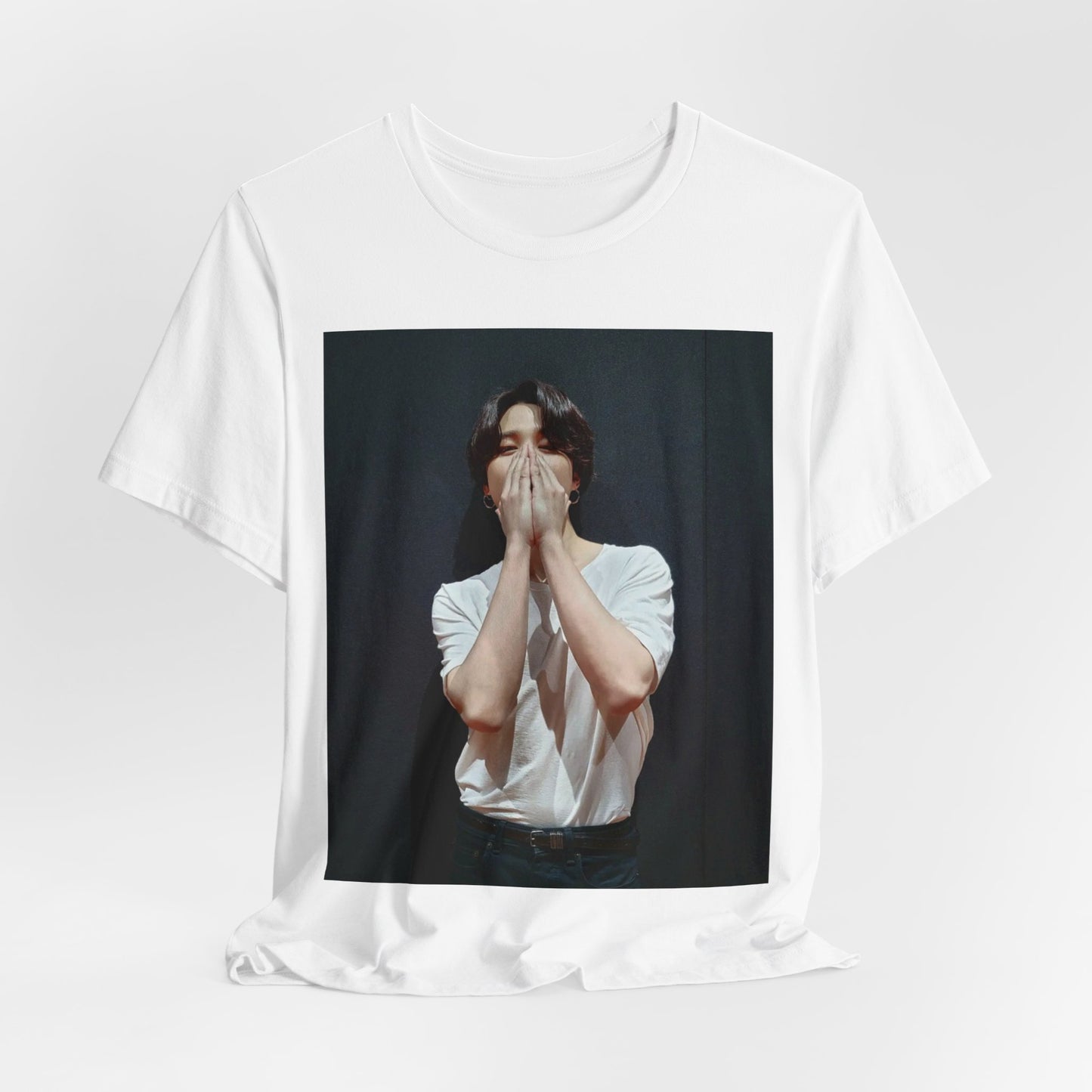A black graphic t-shirt featuring a graphic of Jimin designed for everyday K-Pop style.