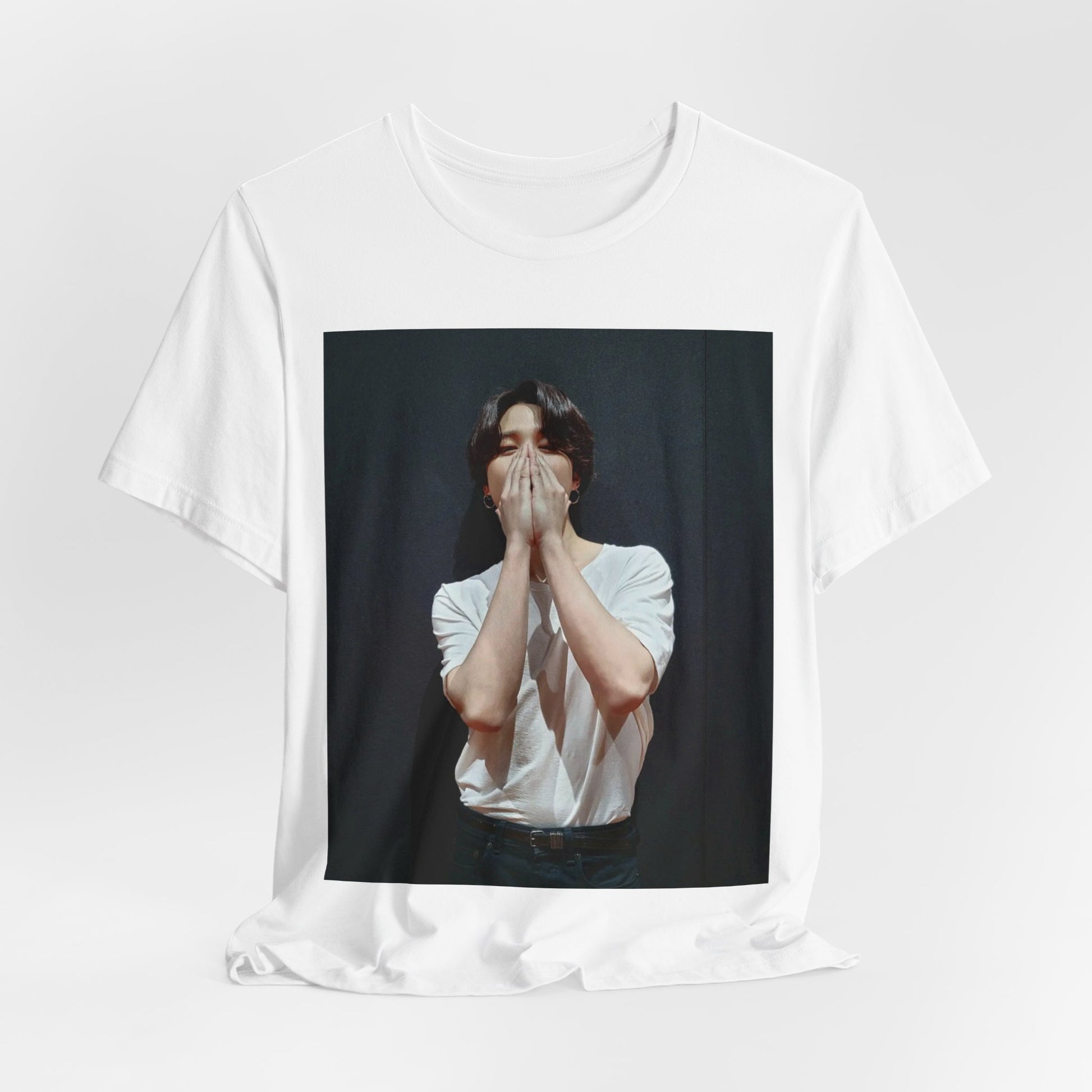 A black graphic t-shirt featuring a graphic of Jimin designed for everyday K-Pop style.