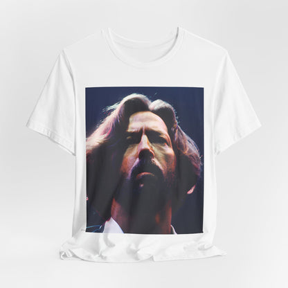 A black graphic t-shirt featuring a graphic related to Eric Clapton's 'Tears in Heaven' song or era.