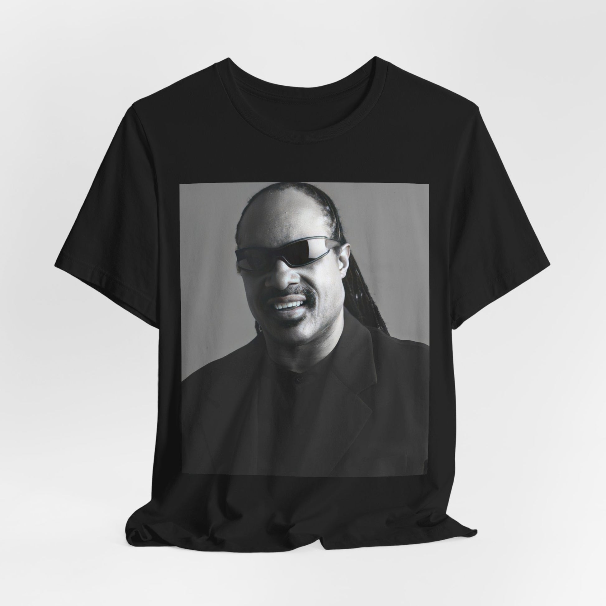 A black graphic t-shirt featuring a classic Motown legend black and white graphic of Stevie Wonder.