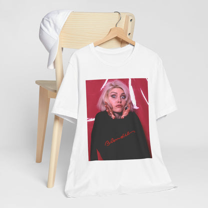 A black graphic t-shirt featuring a graphic related to Blondie's 'Atomic' song or era.