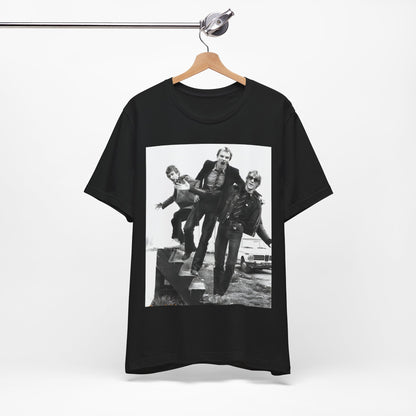 A black graphic t-shirt featuring an early days reggae rock graphic of The Police.