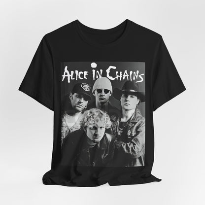 A black graphic t-shirt featuring a black and white photographic portrait of the band Alice In Chains, capturing their iconic grunge look.
