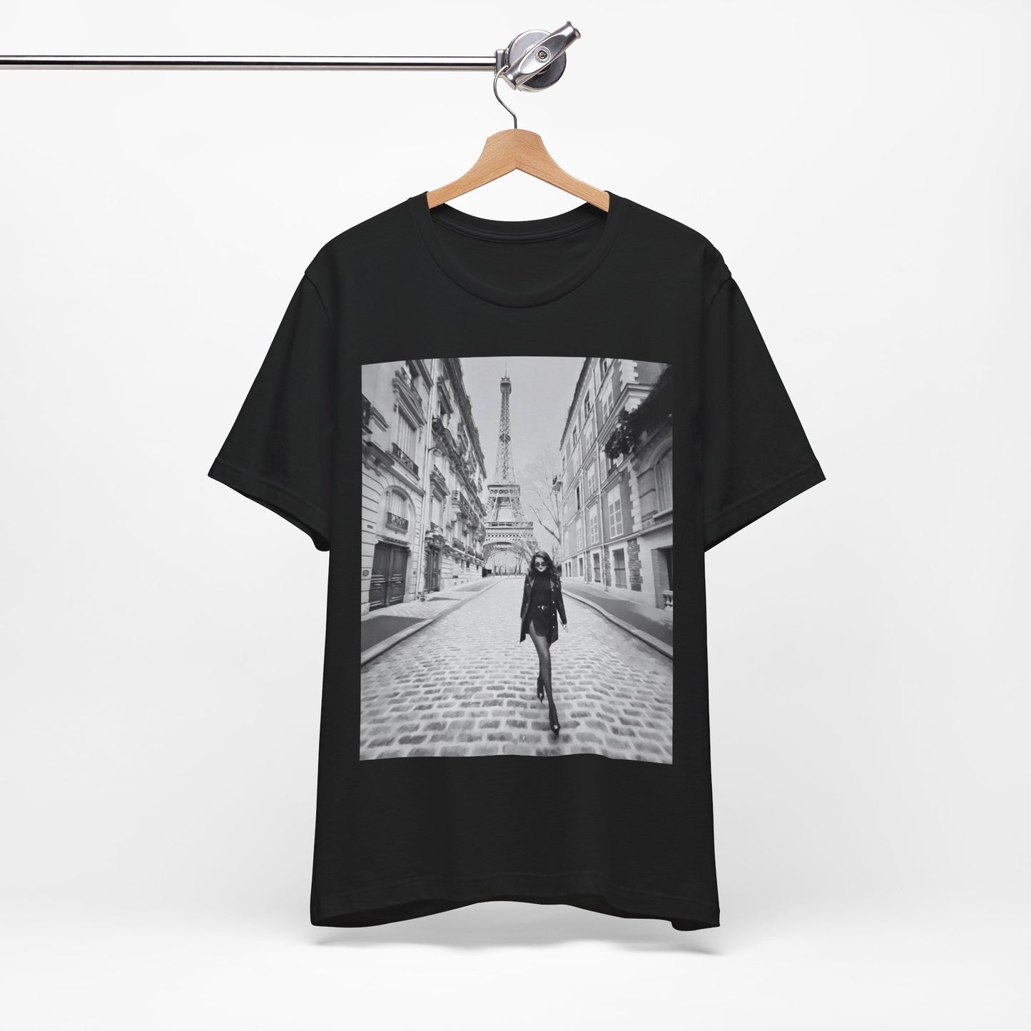 A black graphic t-shirt featuring a black and white photo of Selena Gomez in Paris.