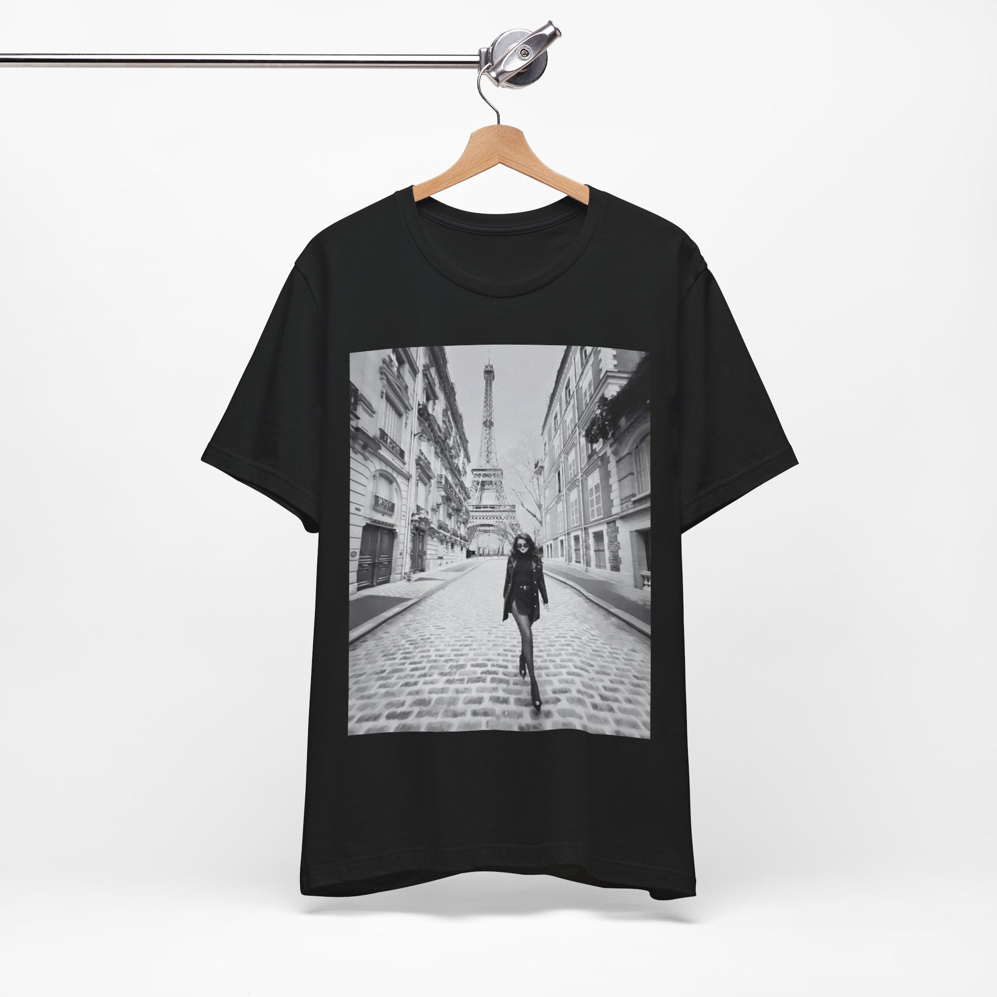 A black graphic t-shirt featuring a black and white photo of Selena Gomez in Paris.