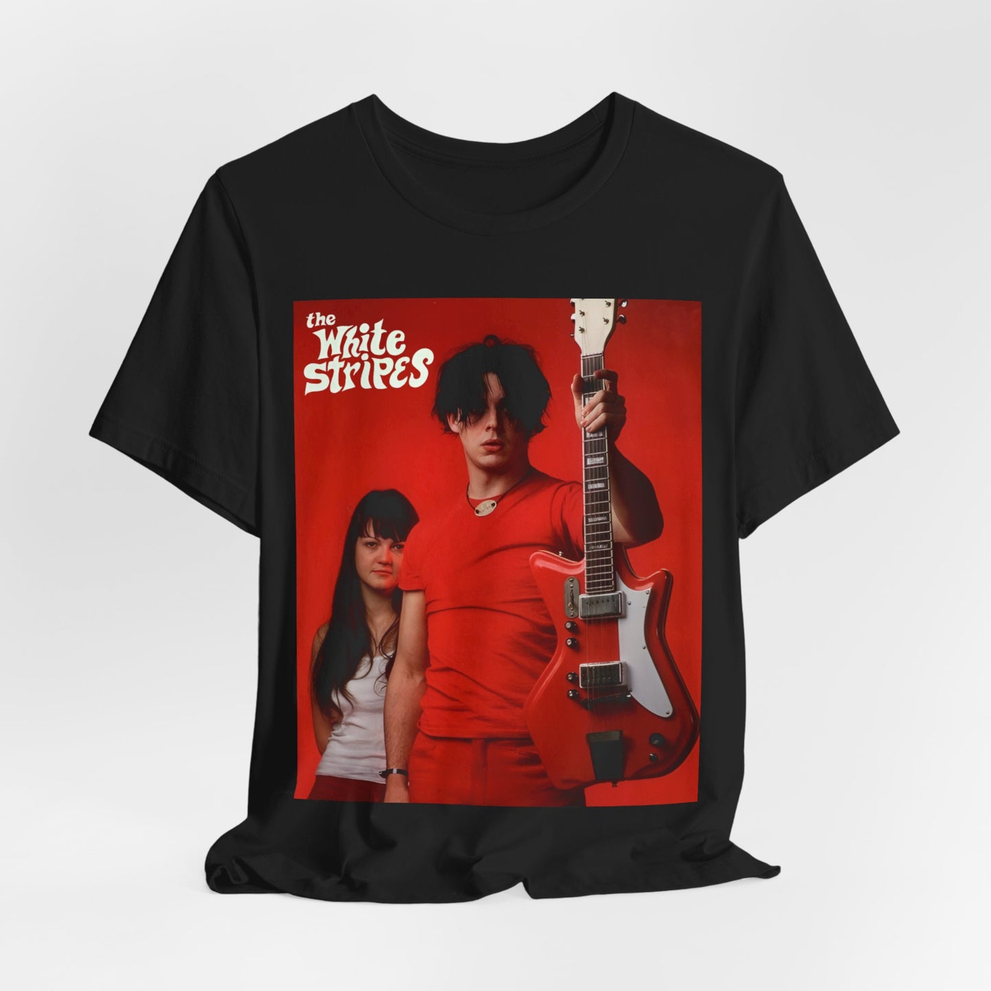 A black graphic t-shirt featuring a vintage garage rock graphic of The White Stripes.