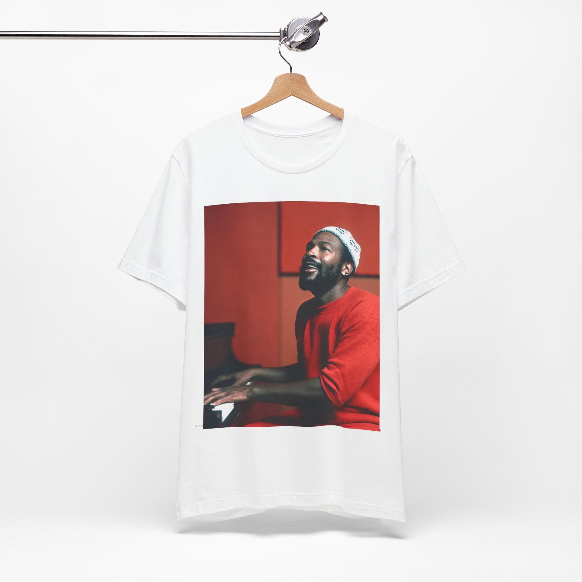 A black graphic t-shirt featuring a graphic of Marvin Gaye with a piano.
