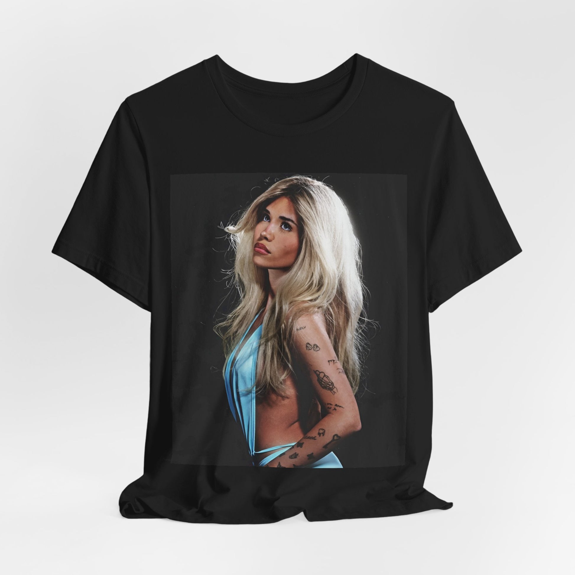 A black graphic t-shirt featuring a graphic related to Nessa Barrett's 'Pain' song or era.