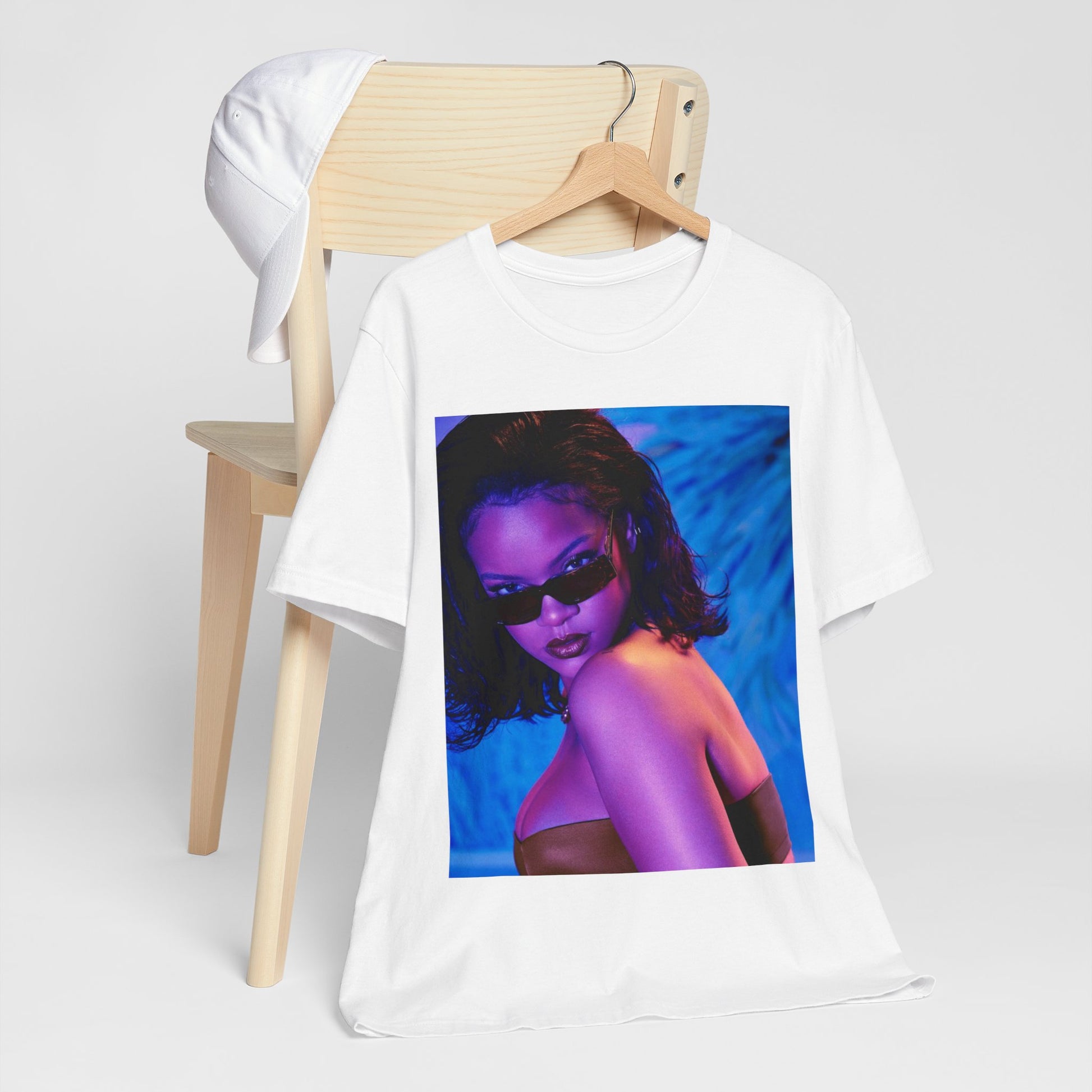 A black graphic t-shirt featuring a retro graphic related to Rihanna's 'Umbrella' song or era.