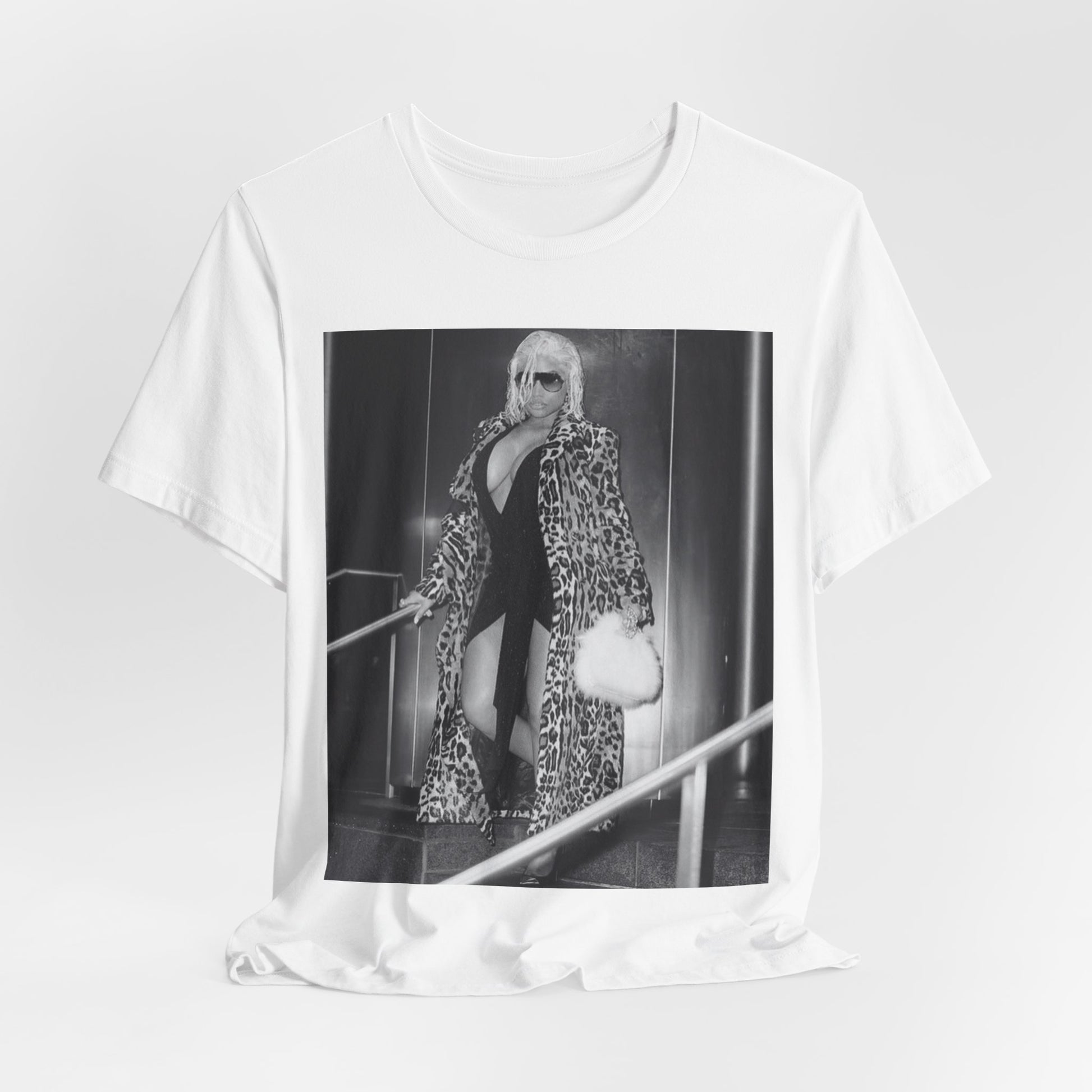 A black graphic t-shirt featuring a black and white glam aesthetic graphic of Nicki Minaj.