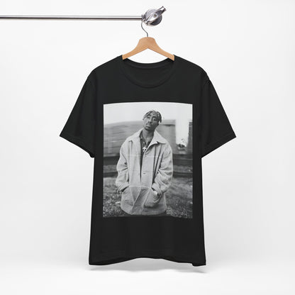 A black graphic t-shirt featuring a graphic related to Tupac's 'Thug Life' philosophy.