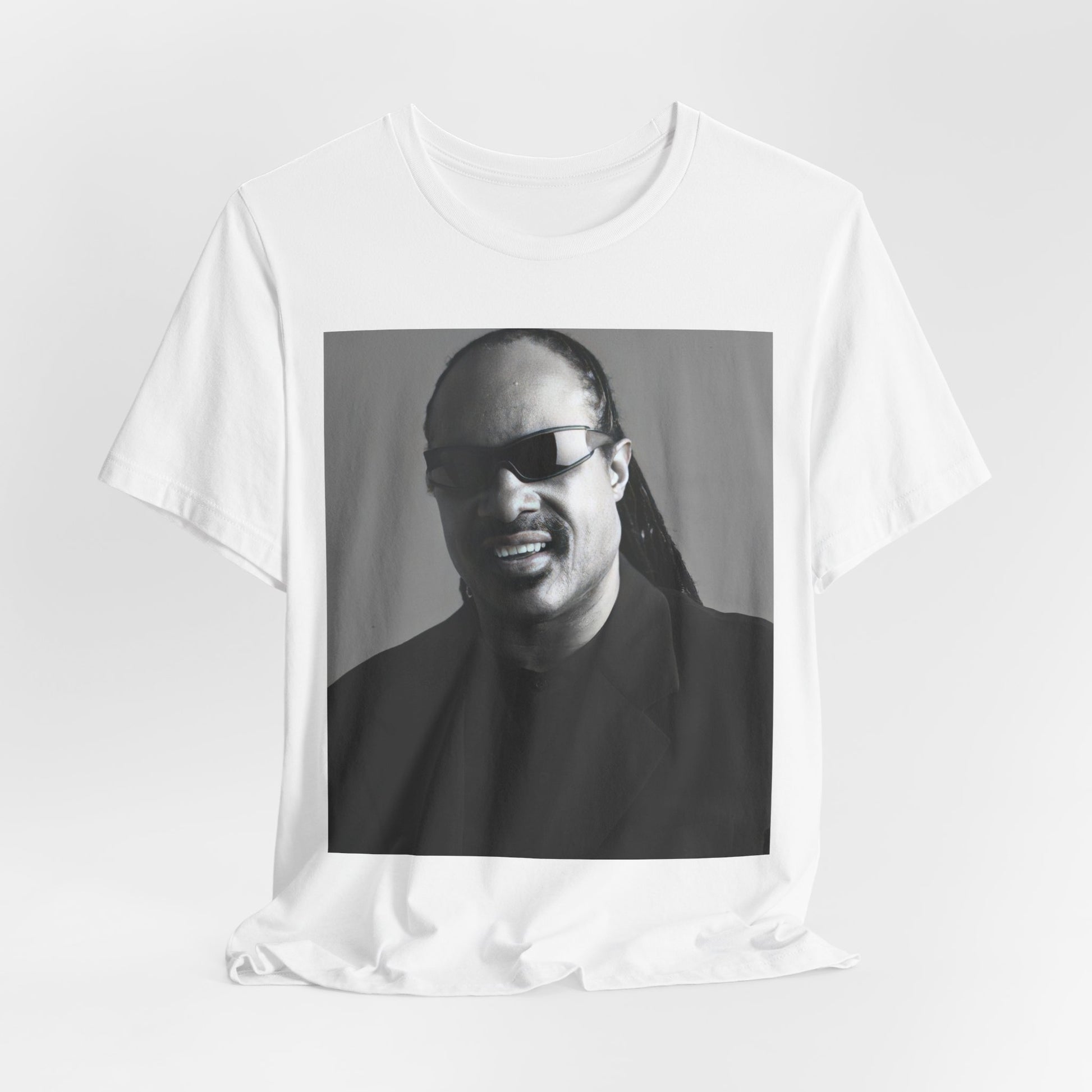 A black graphic t-shirt featuring a classic Motown legend black and white graphic of Stevie Wonder.