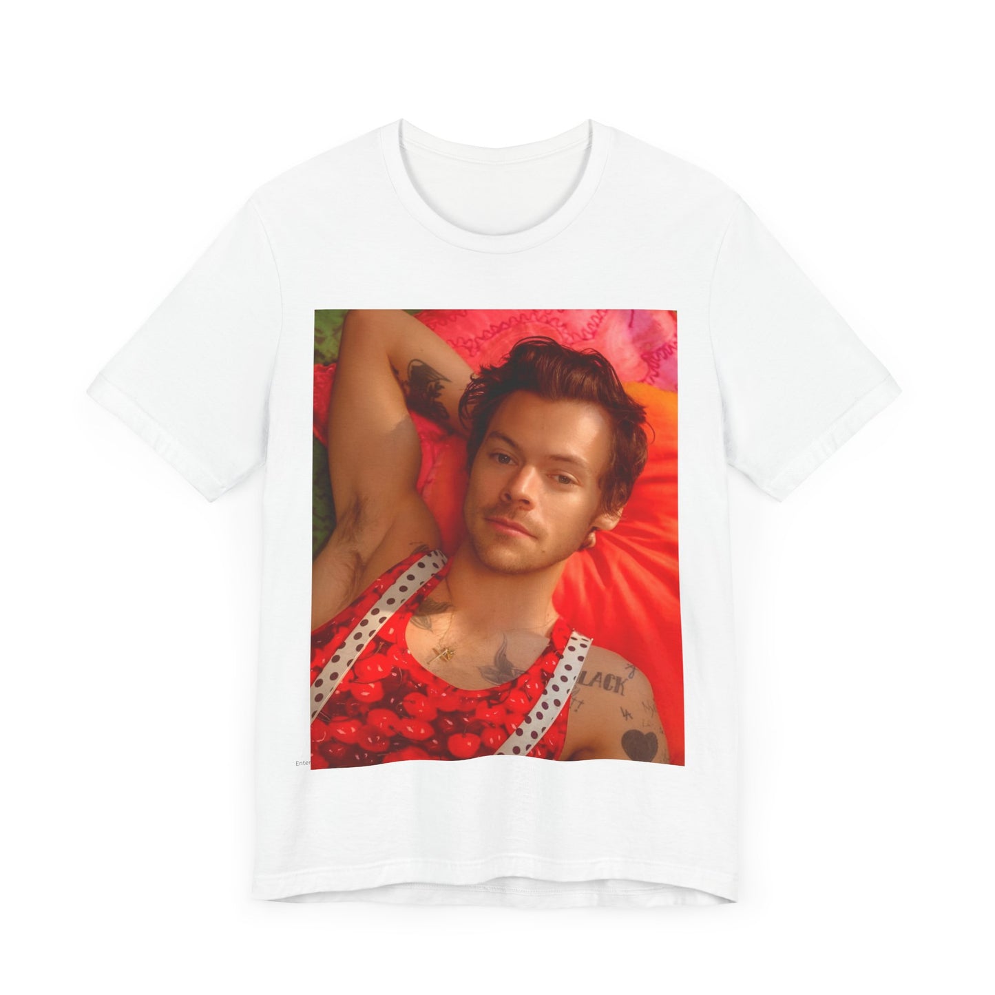 A black graphic t-shirt featuring a graphic of Harry Styles with a chill pop vibe.