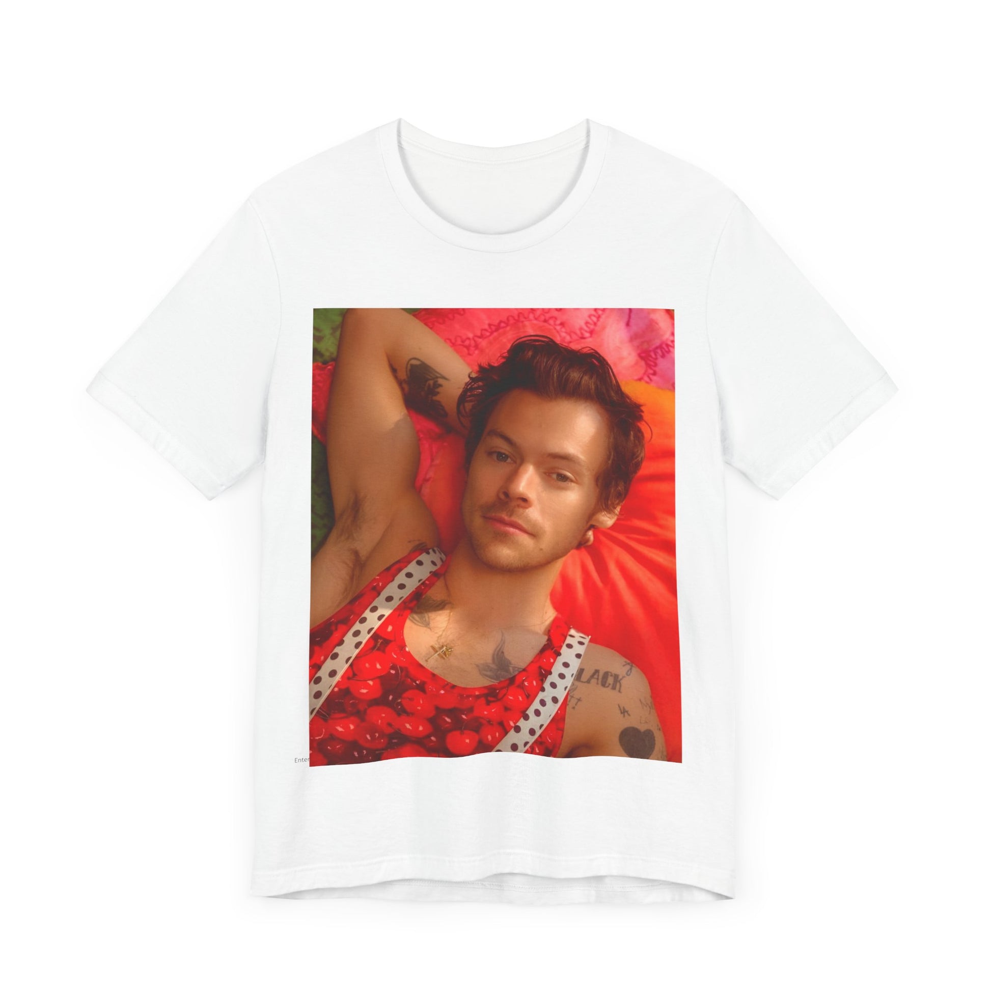 A black graphic t-shirt featuring a graphic of Harry Styles with a chill pop vibe.