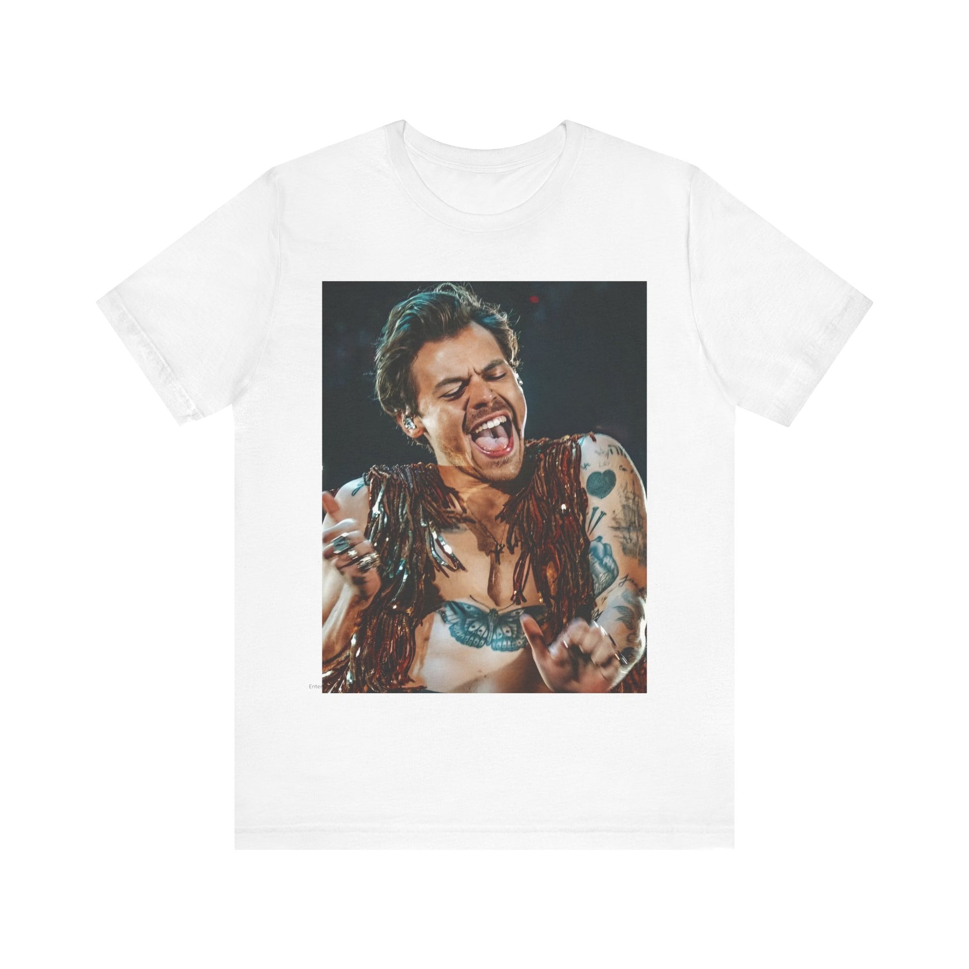 A black graphic t-shirt featuring a graphic or photo of Harry Styles performing live on stage.