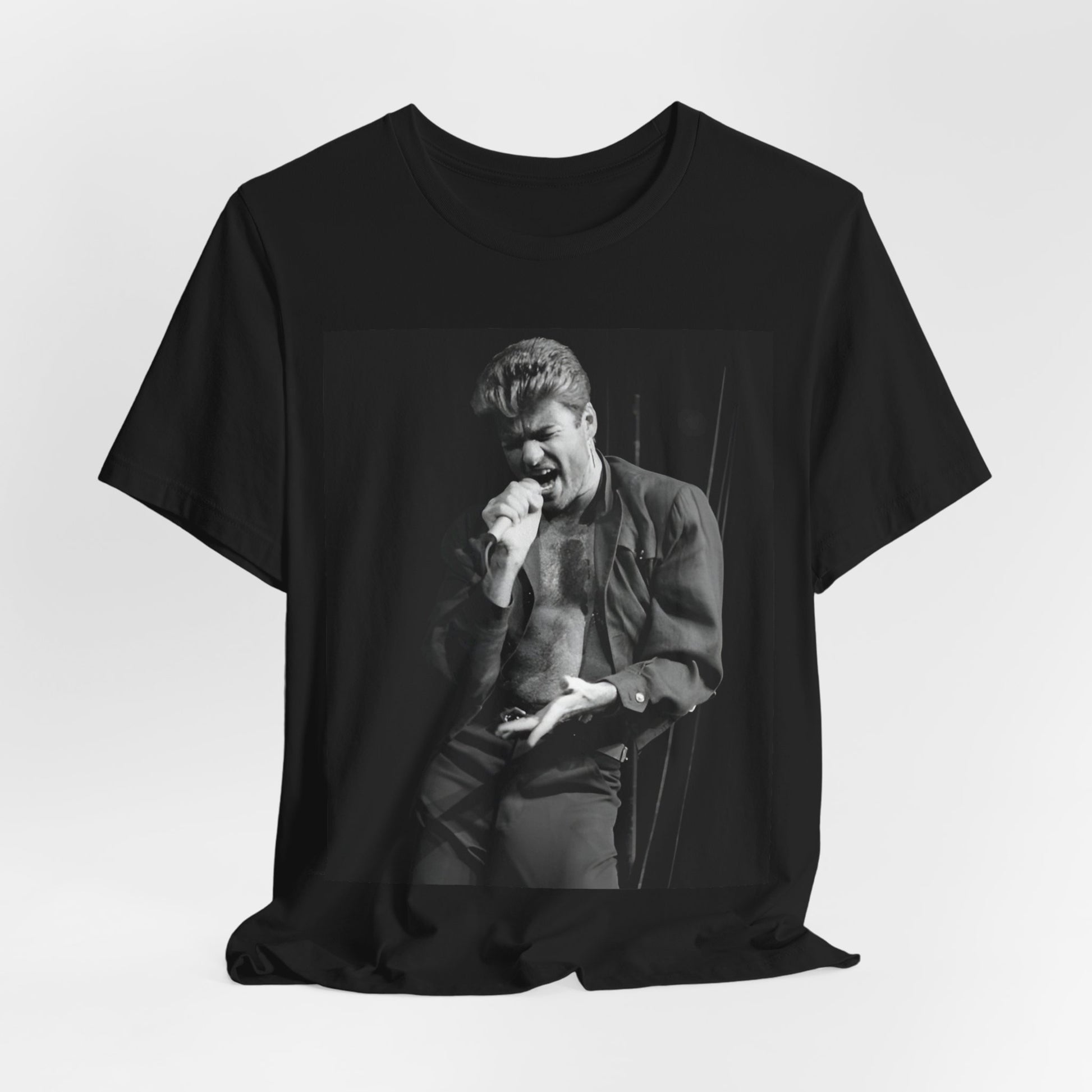 A black graphic t-shirt featuring a glamorous photo or graphic of George Michael performing live.