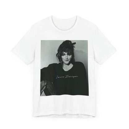 A black graphic t-shirt featuring a casual 80s pop fan graphic of Laura Branigan.