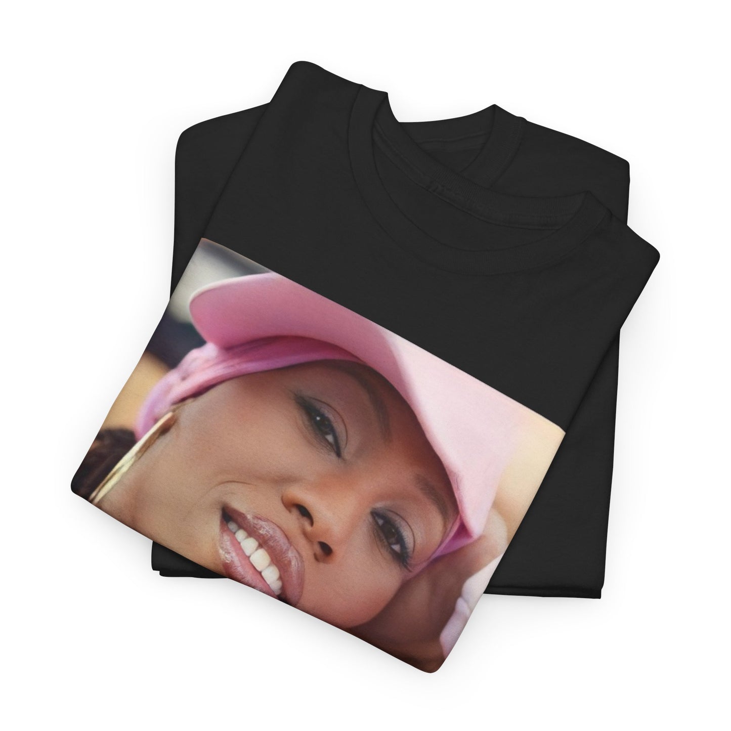 A black graphic t-shirt featuring a 90s rap graphic of Missy Elliott from her early days, emphasizing a raw style.