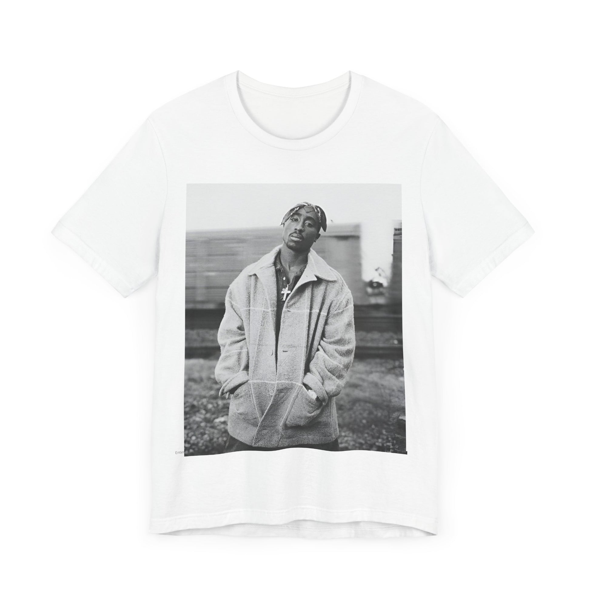 A black graphic t-shirt featuring a graphic related to Tupac's 'Thug Life' philosophy.