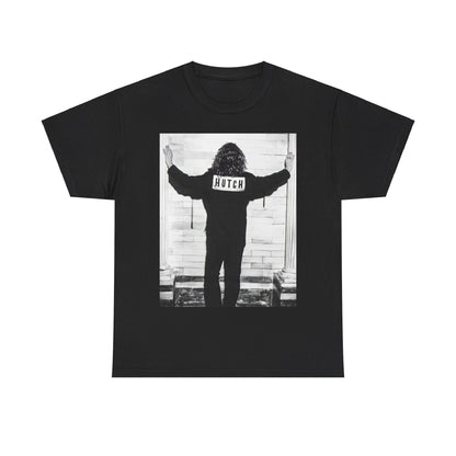 A black graphic t-shirt featuring a graphic of Michael Hutchence from INXS, labeled 'Hutch'.
