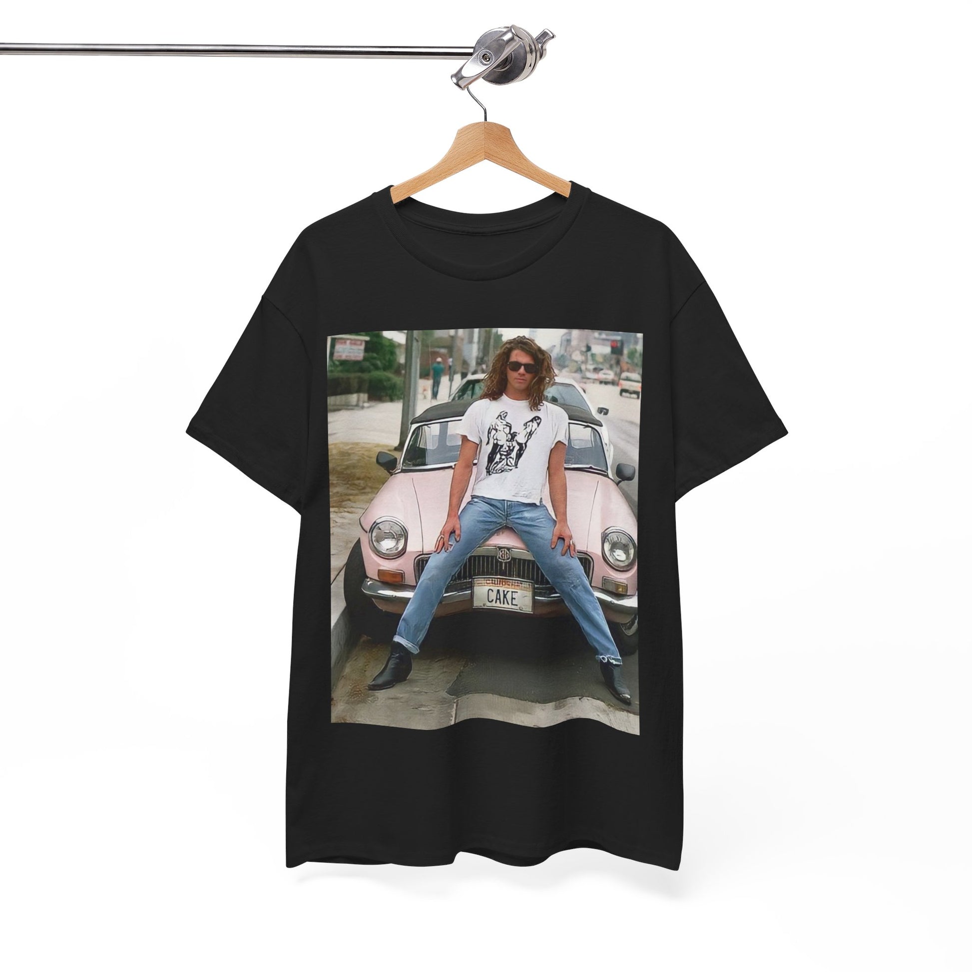 A black graphic t-shirt featuring a vintage photo of INXS band members with a classic car.